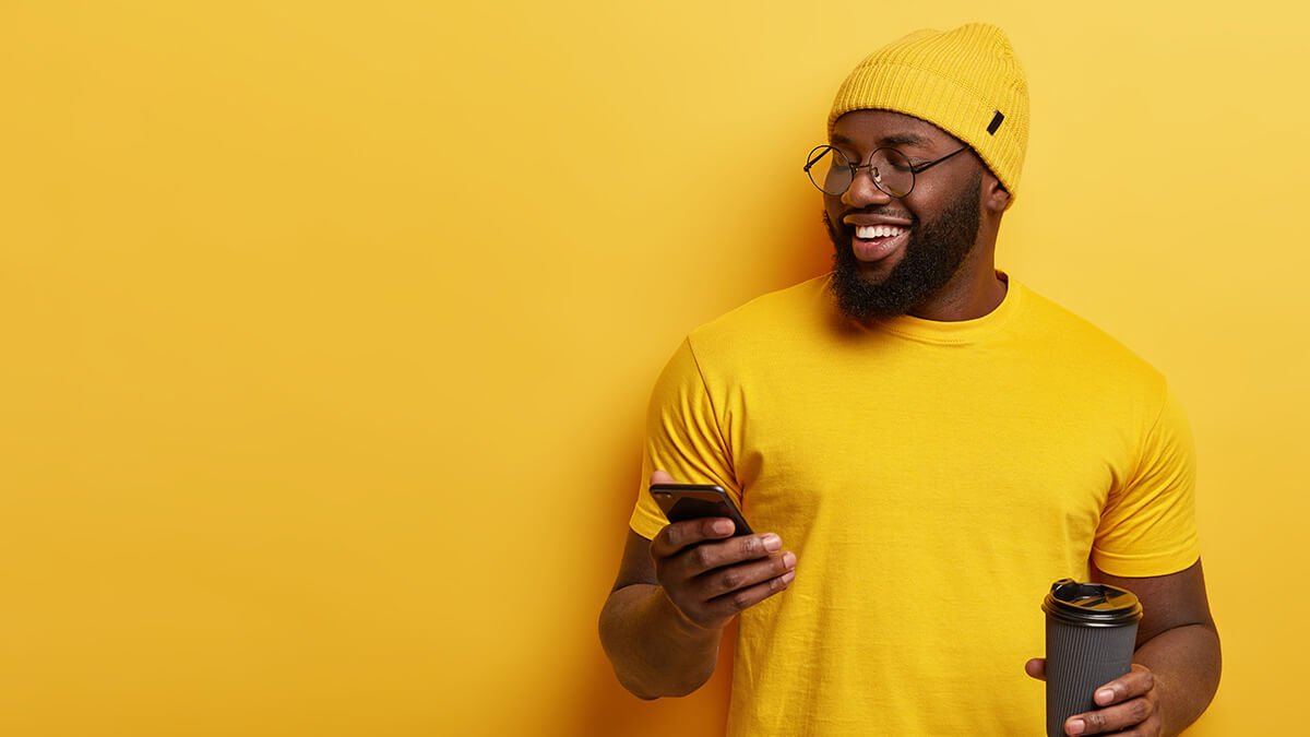 man laughing at phone meme